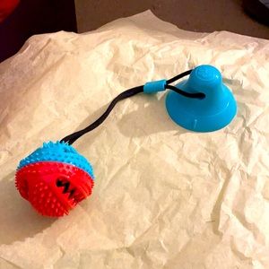 Pet toy tug of war and treat feeder